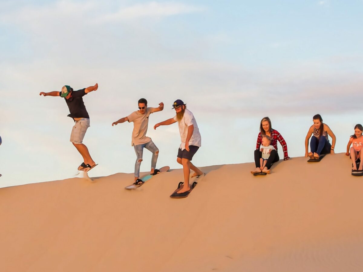 Group by Sand-boarding